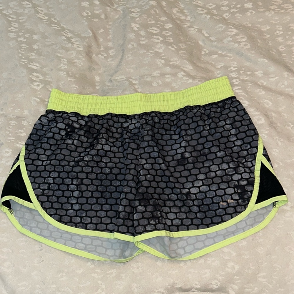 Black and green champion shorts